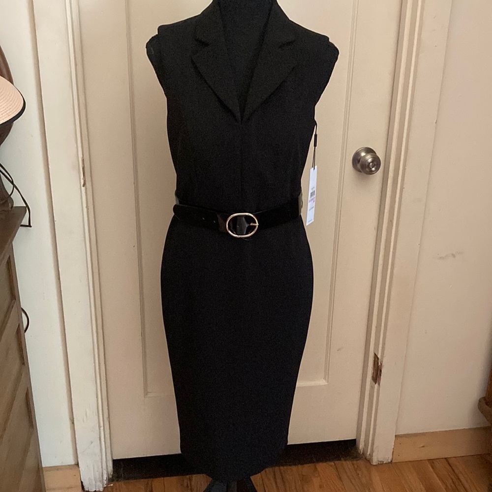 Size 6, Calvin Klein business or social dress. 3/4 length, slight stretch